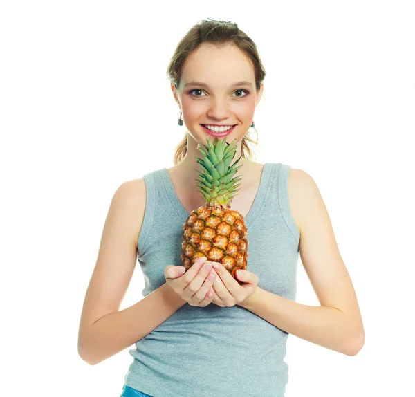 Flicka med en ananas — Stockfoto