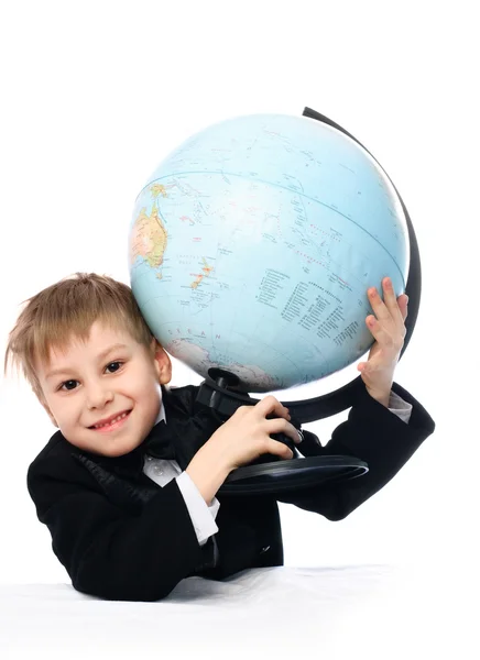 stock image Schoolboy with a globe