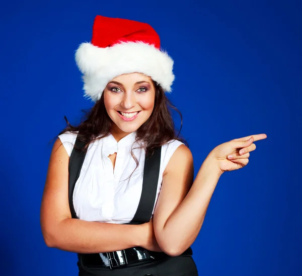 Zakenvrouw dragen een kerstmuts — Stockfoto