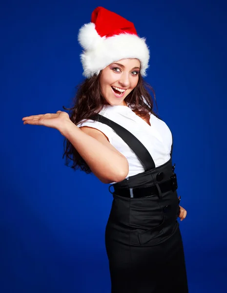 Femme d'affaires portant un chapeau de Père Noël — Photo