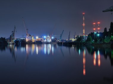Gdansk shipyard at night clipart