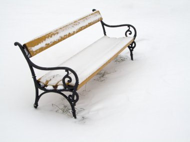 Bench covered in snow clipart