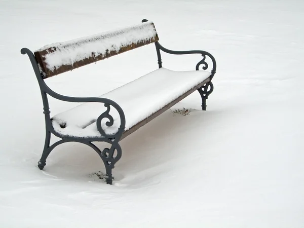 Bench covered in snow — Stock Photo, Image