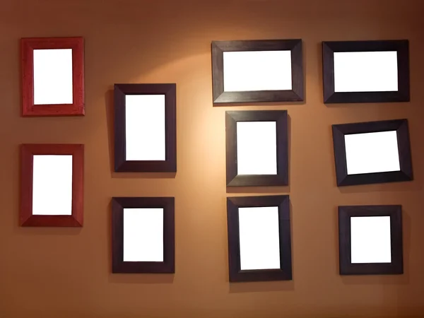 Tien frames op de muur — Stockfoto