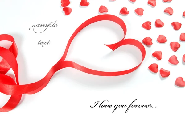 Love background. Small hearts and ribbon — Stock Photo, Image