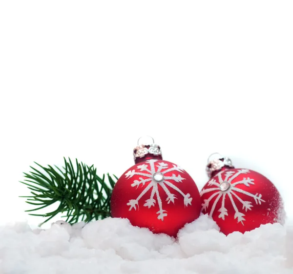 Christmas balls in snow — Stock Photo, Image