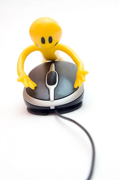 Faccia sorridente e mouse del computer — Foto Stock