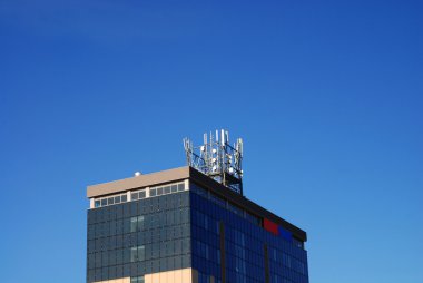 Kyscraper over blue sky clipart