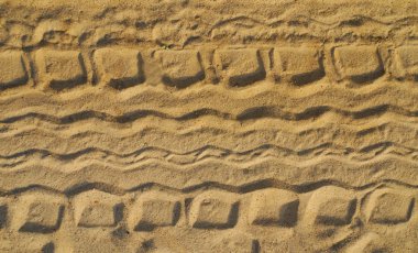 Tyre tracks on beach clipart