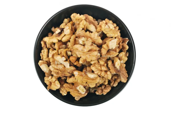 stock image Walnuts in black plate