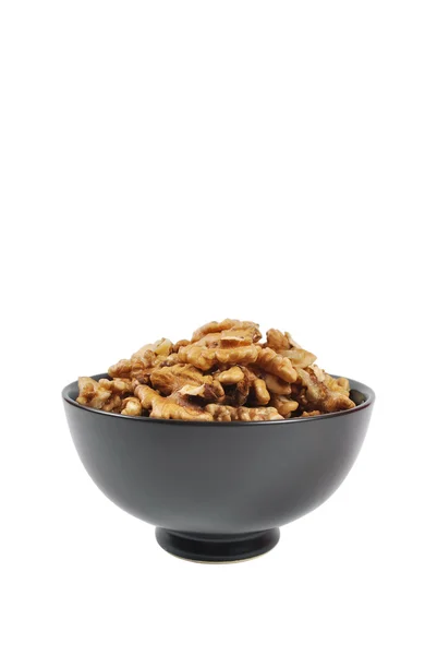 stock image Walnuts in black plate