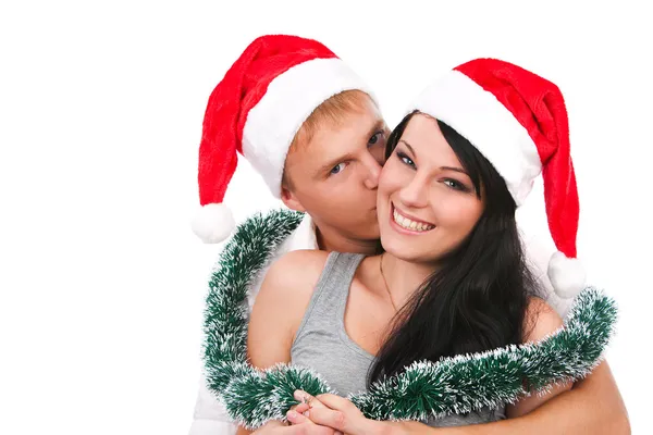 クリスマスを祝う若いカップル — ストック写真