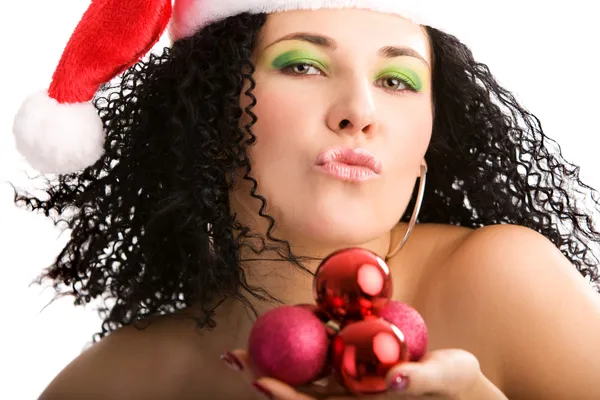 Jonge vrouw in de Kerstman hoed — Stockfoto