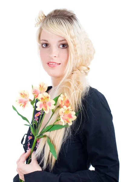 Fiatal nő virágokkal — Stock Fotó