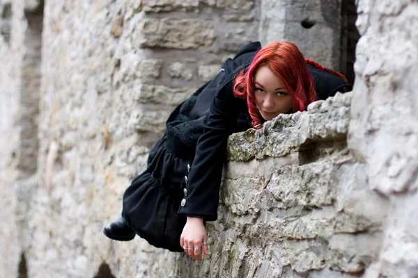 Gothic girl on a wall — Stock Photo, Image