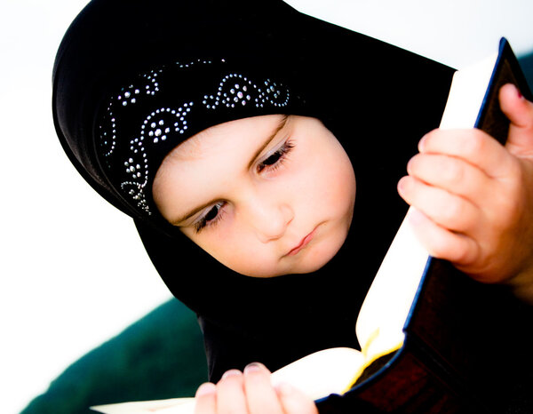 Young adorable Islamic girl