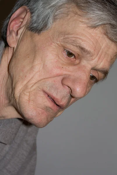 Closeup of a senior man looking away — Stock Photo, Image