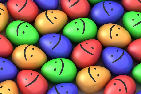 Muchos huevos de Pascua sonrientes de colores —  Fotos de Stock