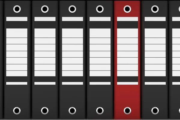 Red file folder among black folders — Stock Photo, Image