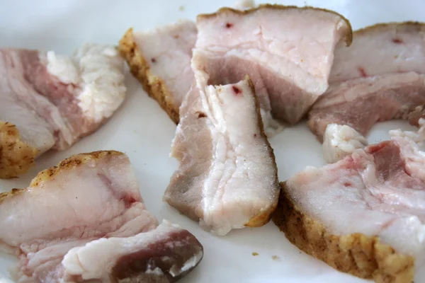 Stock image Pieces of pork fat on a plate