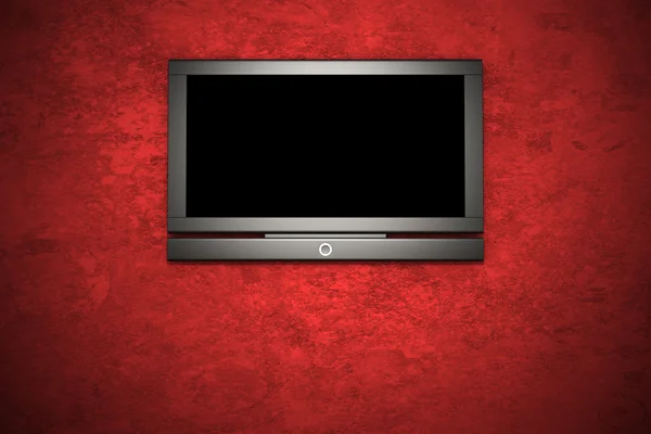 Lcd tv na parede de estuque vermelho — Fotografia de Stock