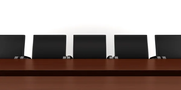 Tavolo riunione marrone con sedie nere — Foto Stock
