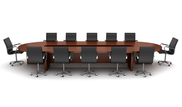 Brown meeting table with black chairs