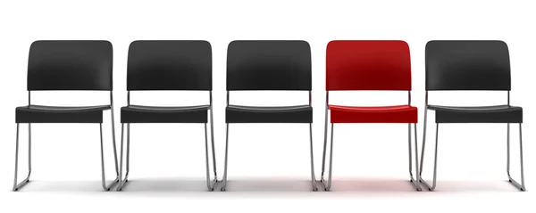 Красное кресло среди черных стульев — стоковое фото
