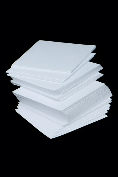 Paper on a black background — Stock Photo, Image