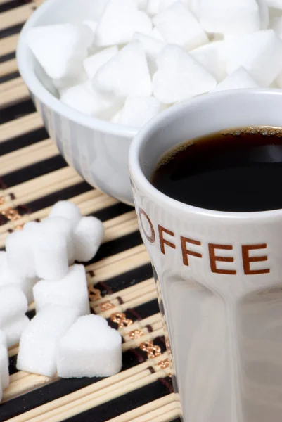 Taza de café negro y azúcar —  Fotos de Stock