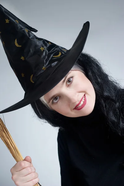 Portret van een schattige heks met hoed — Stockfoto