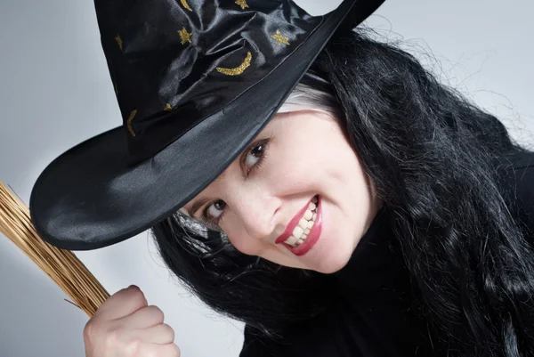 Retrato de una linda bruja con sombrero —  Fotos de Stock