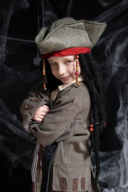 Little boy wearing pirate costume clipart