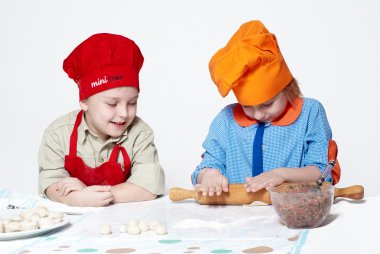 Small chefs, working with the dough clipart