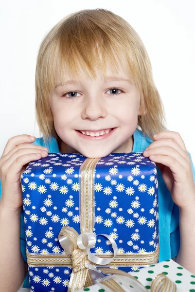 Little boy with gifts — Stock Photo, Image