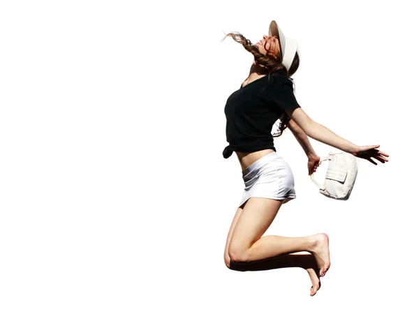 A jovem em um salto feliz — Fotografia de Stock