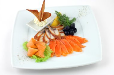 Fish plate with vegetables clipart