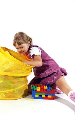 Young girl playing with blocks