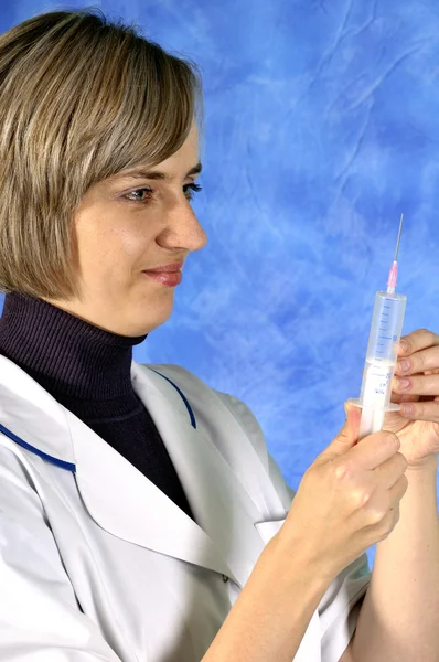 Doctor preparing injection Stock Image