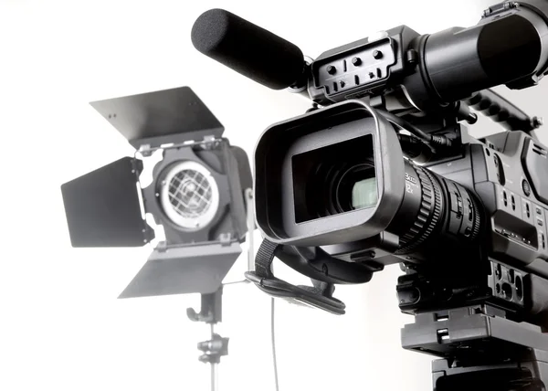 Dv camcorder and light — Stock Photo, Image