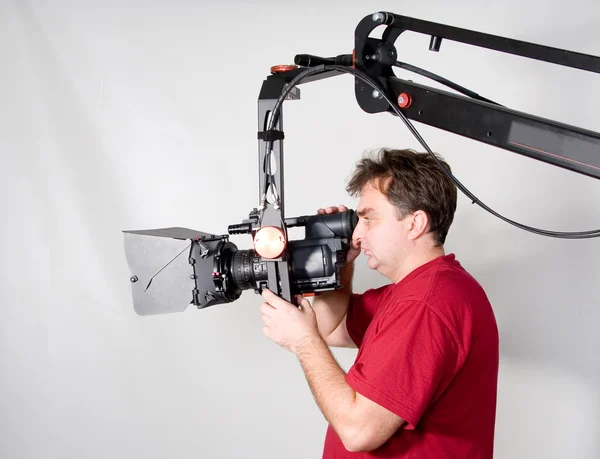 Kameramies työskentelee nosturin kanssa — kuvapankkivalokuva