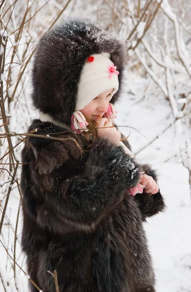 Little girl on the snow — Stock Photo, Image