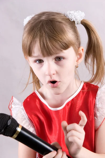 Girl and microphone — Stock Photo, Image