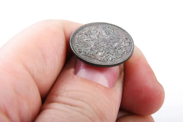 Gamla mynt i handen — Stockfoto