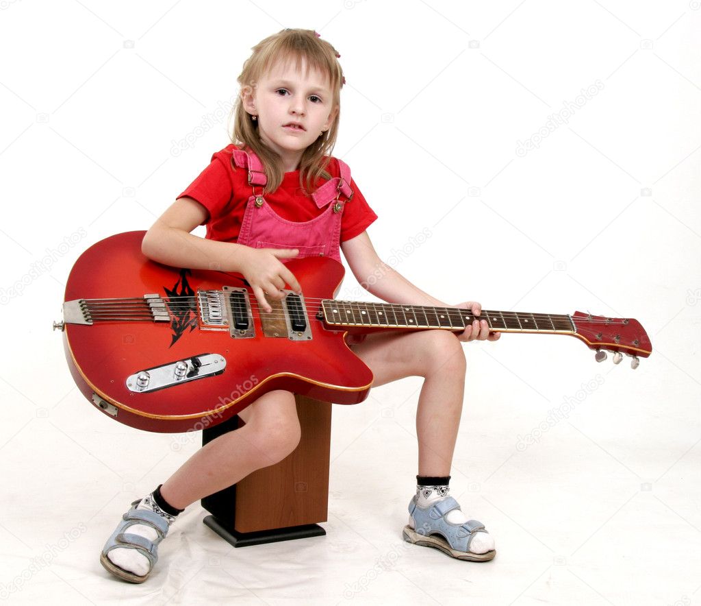 Little girl and guitar