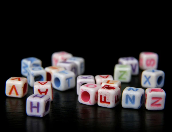 Ladrillos de juguete con letras —  Fotos de Stock