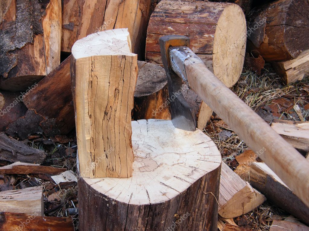 Log pump tree with axe Stock Photo by ©gasaz76 1830165