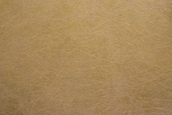 Estrutura de um tecido de cor dourada — Fotografia de Stock