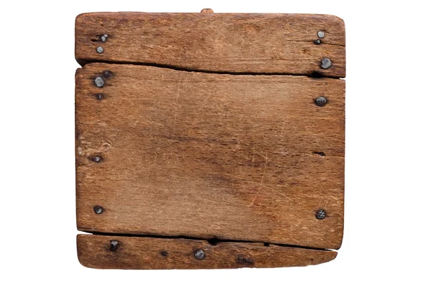 Старая деревянная доска с ногтями — стоковое фото