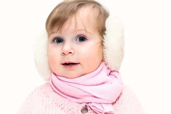 Little girl in fur headphones — Stock Photo, Image